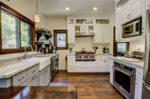 Taj Mahal Quartzite Kitchen with Apron Sink